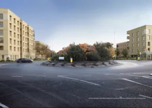 A a digital render of a tree planted roundabout in the foreground, flanked by light brick flats either side of the road.